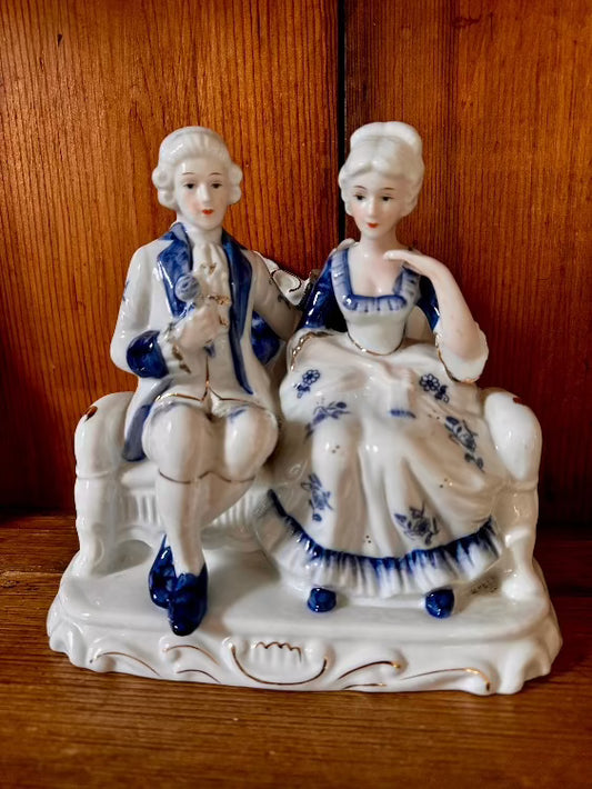 Ronaldo collection blue and white china figurine of couple on a bench vintage