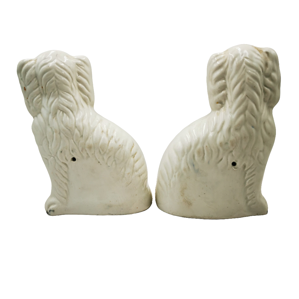 Pair of Antique White Cream & Copper Lustre Decorated Staffordshire Style China Dogs Two white ceramic dog figurines on a white background