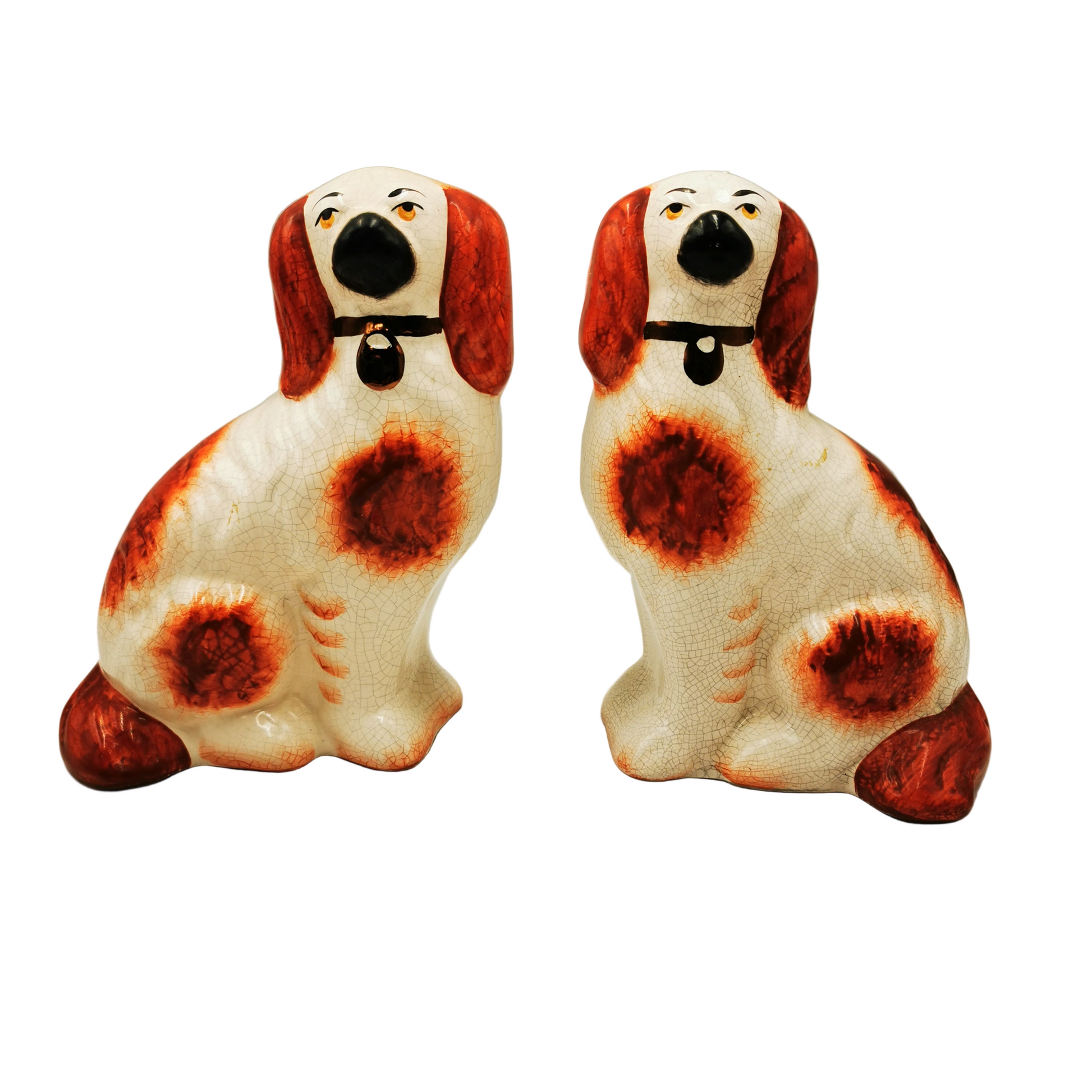 Pair of Medium Slip Molded Staffordshire Spaniel Style China Dogs