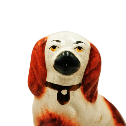 Pair of Medium Slip Molded Staffordshire Spaniel Style China Dogs