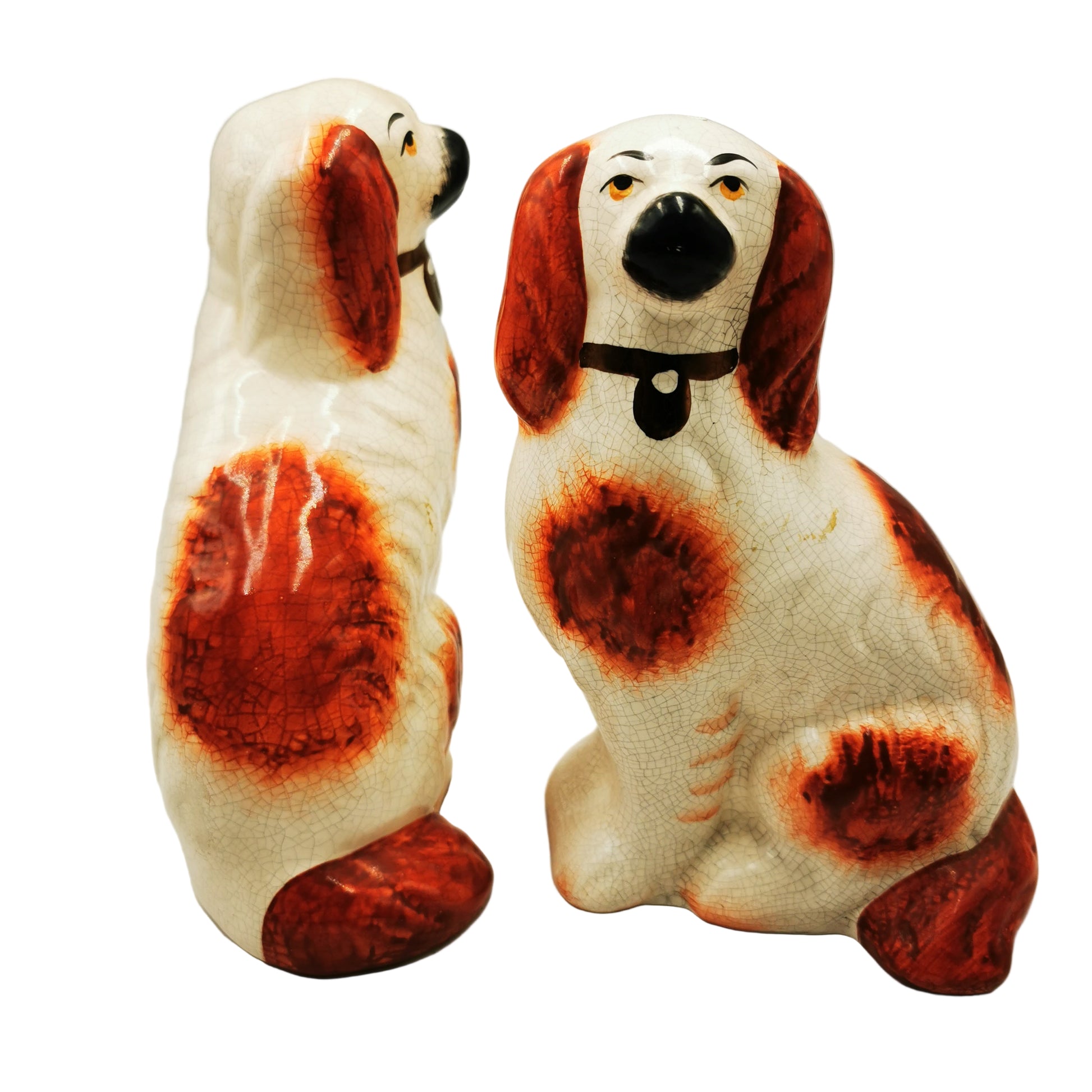 Pair of Medium Slip Molded Staffordshire Spaniel Style China Dogs