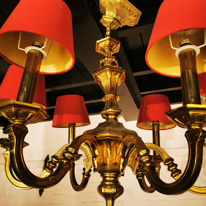 large brass chandelier red shades