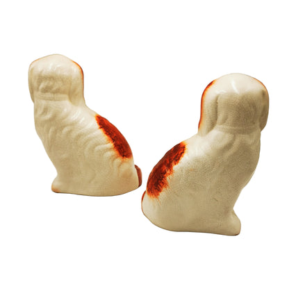 Pair of Medium Slip Molded Staffordshire Spaniel Style China Dogs